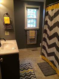 A bold bathroom with a chevron floor. 13 Best Bathroom Remodel Ideas Makeovers Design Small Bathroom Ideas Pictures How To Decorate Gray Bathroom Decor Yellow Bathroom Decor Yellow Bathrooms