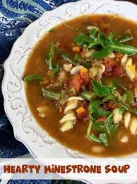 This Satisfying Hearty Minestrone Soup Features A Classic Combination Of Fresh Herbs Vegetables White Beans Minestrone Soup Minestrone Soup Easy Minestrone