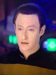 Data's eyes are blue in one universe of TNG