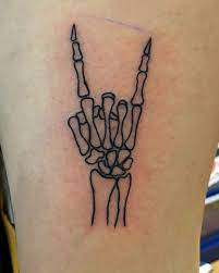 101 Amazing Skeleton Hand Tattoo Ideas That Will Blow Your Mind Simplistic Tattoos Skeleton Hand Tattoo Hand Tattoos