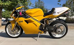 Image result for Nuget Yellow 1999 Motorcycle