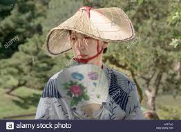 A Japanese Woman In Traditional Dress With Straw Hat And Fan At The Annual Japanese Festival At The Missouri Botanical Garden In Stock Photo Alamy