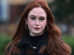 Woman, 20, kicked and punched in the face