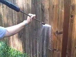 Next, paint the wood and let it dry for approximately 15 to 20 minutes. How To Powerwash Stain A Fence Staining Wood Fence Wooden Fence Patio Fence
