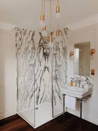 After all, tile flooring in intricate patterns, with delicate, petite tiles, is nothing new. 75 Beautiful Bathroom With Marble Tiles Ideas Designs July 2021 Houzz Uk
