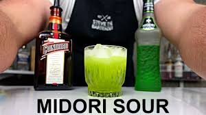 Midori Sour Cocktail Recipe + NEW VIDEO SETUP!! - YouTube