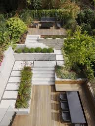 Back Garden Patio With Different Hardscape And Levels Dining Area With Built In Bench And Living Ro Modern Landscaping Small Backyard Landscaping Gable House