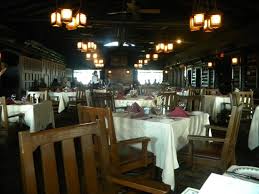Natural black angus burger on ciabatta roll. El Tovar Dining Room Wild Country Fine Arts