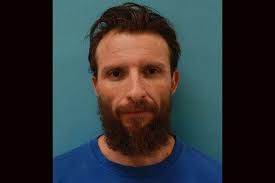 Raid Led To A Brother's Arrest But Not the One Targeted