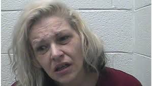 East Tennessee couple arrested after autistic girl found in wooden cage