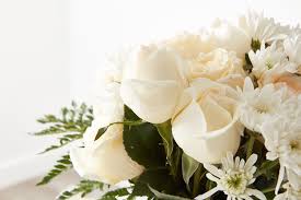 What flower symbolizes death of a loved one? What You Need To Know About A Celebration Of Life