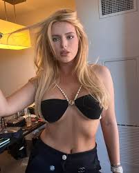 Bella Thorne busts out of sexy corset top in stunning new pic