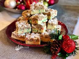 Use the melted butter to brush an 8 cake pan, line the pan with two pieces of long parchment paper and a piece of round parchment paper to cover the bottom of the pan, let the excess hang over the sides for handles. Best Ever Crumb Cake Swirls Of Flavor