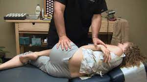 First Time Chiropractor Hip Adjustment Demonstration By Austin Chiropractic Care Chiropractic Care Chiropractic Massage Therapy