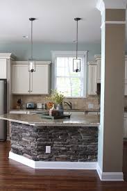 love the stone base kitchen island