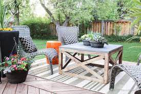 Browse a wide variety of outdoor coffee table designs on houzz, including wicker, teak and rattan styles, perfect for outdoor entertaining and dining. Remodelaholic Build A Square Outdoor Diy Coffee Table With Wood X Base