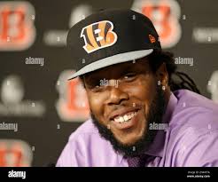 Will Clarke, a defensive end from West Virginia, answers questions during a  news conference, Saturday, May 10, 2014, at the NFL football team's stadium  in Cincinnati. (AP Photo/Al Behrman Stock Photo