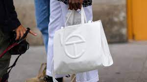 Telfar medium silver shopping bag. Why No One Can Knock Off Telfar Gq