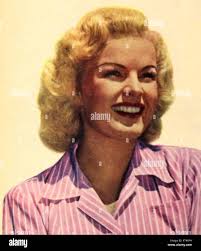 June Haver was an American actress and singer who rose to prominence in the  1940s. In 1946, she appeared in various films, contributing to her career  in the entertainment industry Stock Photo -