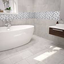 White bathrooms always seem clean, beautiful, and spacious, and small mosaic tiles can add that special touch to the floor or the walls, depending on where you use it. House Of Mosaics Carrera Mix Wall And Floor Mosaic