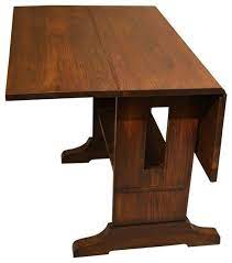 Great for expanding to accommodate a group, then returning it to its more compact size for regular use, a hidden leaf dining table can give you the luxury of a large table without the constant problem of it taking up too much space. Mission Solid Oak Drop Leaf Dining Table Transitional Dining Tables By Crafters And Weavers Houzz