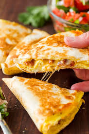 Breakfast is not only the first meal of the day but also the most important one. Breakfast Quesadillas 3 Easy Ways Video Natashaskitchen Com
