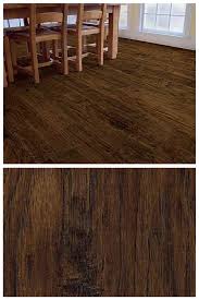 Trafficmaster Saratoga Hickory S Hand Scraped Texture And Warm Chocolate Brown Tones Will Give Your Home An Inviting Character This Lamina Home Flooring House