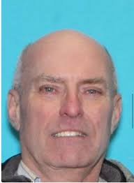 Can someone please make a photo of this person in an oversized Foreigner  band tshirt and no pants? (He's ALLEGEDLY a naked and armed murder suspect 