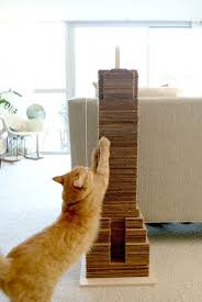 They Tried To Put Me On The Cover Of Vogue Cat How To Skyscraper Cat Scratcher Diy Cat Scratcher Cat Diy Pet Diy Projects