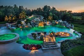 Backyard pool luxury with a hot tub premier pools and spas. Extreme Backyards Luxury Pools Outdoor Living