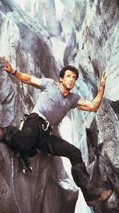 A cliffhanger ending is a plot device in which a movie, novel, or other work of fiction contains an abrupt ending, often leaving the main characters in a precarious or difficult situation. Cliffhanger 1993 Phone Wallpaper Moviemania Sylvester Stallone Sylvester Epic Movie