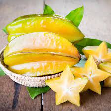 The fruit has distinctive ridg. La Carambole Bienfaits Apports Nutritionnels Idees Recettes Tout Savoir Sur Le Fruit En Forme D Etoile Doctissimo