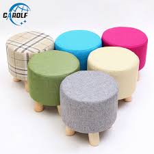 Features a round stool with 4 small plastic legs underneath material: High Stool Round Ottoman Stool Small Wooden Soft Rest Chair Quadruped Pouffe Footstool Seat Plaid Fabric Stool Stools Ottomans Aliexpress