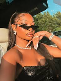 Prompt: Hyper realistic image black Mercedes G-Wagon with a (color)  interior — quilted (color) leather seats, (color) suede ceiling, and a  covered (color) leather steering wheel with a Mercedes emblem. The vehicle's