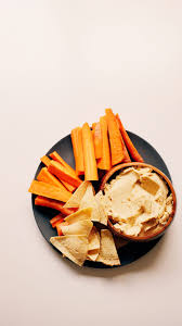 There are a lot of different kinds of hummus and many different brands. Home Made Hummus Plate Plant Based Gluten Free Oil Free New Norm Co
