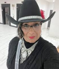 Pinning ceremony for college assistant program recipient