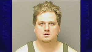 Man charged with arson of girlfriend's apartment