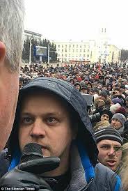 Manager of Russian mall destroyed by blaze is dragged into court