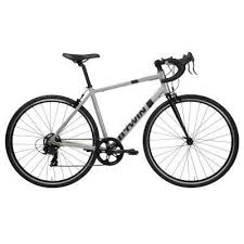 Decathlon B Twin Triban Rc100 Road Bike Grey Few Sizes Remaining Only To Clear At Cycling Bargains B Twin Road Bike Touring Road Bike