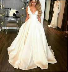 Christina wu brides dresses the dreams of stylish brides with wedding gowns that are crafted to perfection, with decadent beading and luxurious fabrics. Elegant Deep V Neck Ivory White Wedding Dress Ball Gown Satin Open Back Bridal Dresses 387 Satin Bridal Gowns Wedding Dresses Satin V Neck Wedding Dress