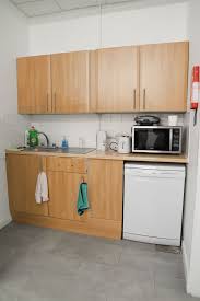 The choice between painting and staining your cabinets will depend on a number of factors. How To Paint Laminate Mdf Kitchen Cabinets Dainty Dress Diaries