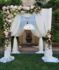 Hydrangeas Peonies Cabbage Roses In White Blushes And Pinks For This Chuppah Arc Outdoor Wedding Decorations Wedding Entrance Decor Outdoor Wedding Ceremony