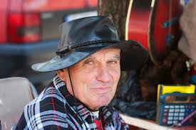 Image of Skipper Mike Birch of Canada, 71, pulls