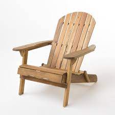 Plastic adirondack chairs are totally carefree—exactly what outdoor lounging is about. Noble House Hanlee Natural Stained Folding Wood Adirondack Chair 9402 The Home Depot Wood Adirondack Chairs Folding Adirondack Chairs Adirondack Chair