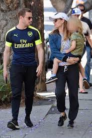 Evan rachel wood's mother's name was moore, it is possible her uncle is roger moore (i.e. Kate Mara Carries Husband Jamie Bell S Son On Lunch Outing In La Daily Mail Online