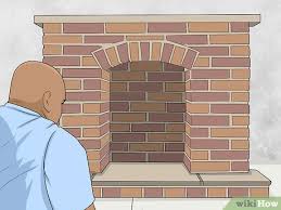 Start on the top layer of bricks and work your way down toward the base of your chimney. Simple Ways To Remove A Brick Fireplace With Pictures Wikihow