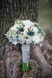 Hints of green are common in white wedding. Blue And White Winter Wedding Bouquet Emmalovesweddings