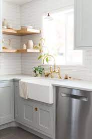 The individual tiles have a soft visual texture created with many small horizontal lines in soft shades of gray and white. when renovating a kitchen or subway tiles—replicas of the classic rectangular white ceramic tiles used in the new york city subway—are still popular. 170 Best White Kitchen Tile Ideas In 2021 Tile Trends Kitchen Kitchen Tile