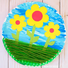 These watercolor paper plate flowers are a picture of perfection and they look truly exquisite. Flowers In The Garden Craft For Kids Spring Craft Idea