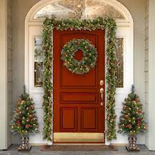5 Ways To Make Your Front Door Look Festive For Less Than 50 Outdoor Christmas Christmas Door Decorations Christmas Lights